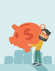 Image showing Man with his big piggy bank