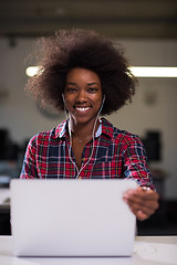 Image showing portrait of a young successful African-American woman in modern 