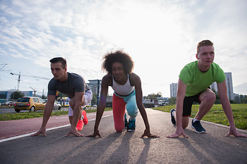 Image showing multiethnic group of people on the jogging