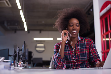 Image showing portrait of a young successful African-American woman in modern 