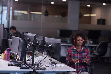 Image showing portrait of a young successful African-American woman in modern 