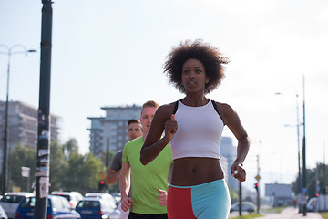 Image showing multiethnic group of people on the jogging