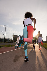 Image showing multiethnic group of people on the jogging