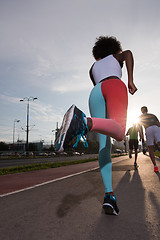 Image showing multiethnic group of people on the jogging