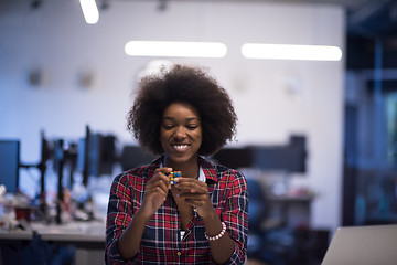 Image showing portrait of a young successful African-American woman in modern 