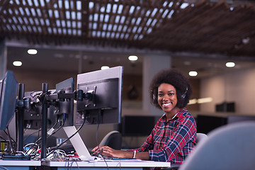 Image showing portrait of a young successful African-American woman in modern 