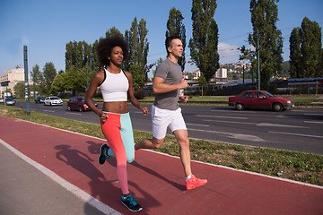 Image showing multiethnic group of people on the jogging