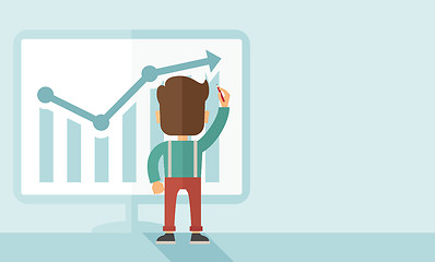 Image showing Successful businessman with a chart going up
