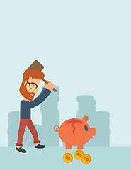 Image showing Man breaking piggy bank