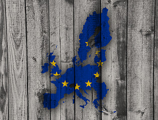 Image showing Map and flag of the EU on weathered wood