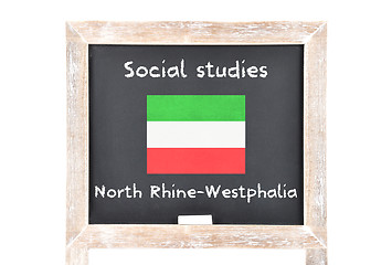 Image showing Social studies with flag on board