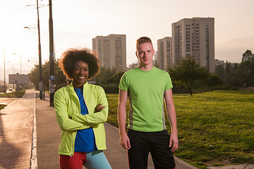 Image showing Portrait of romantic pretty couple on fitness session, outside t