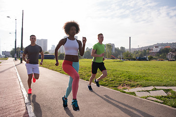 Image showing multiethnic group of people on the jogging