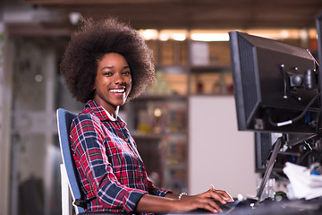 Image showing portrait of a young successful African-American woman in modern 