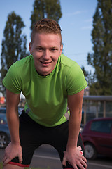 Image showing portrait of a young man on jogging