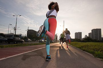 Image showing multiethnic group of people on the jogging