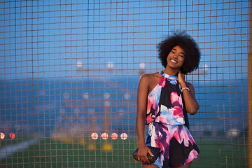 Image showing portrait of a young African-American woman in a summer dress