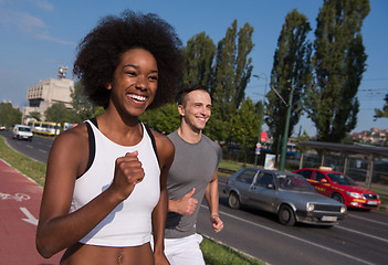 Image showing multiethnic group of people on the jogging