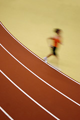 Image showing Motion blurred runner