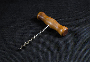 Image showing Vintage corkscrew on black