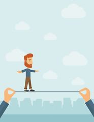 Image showing Businessman walking on wire.