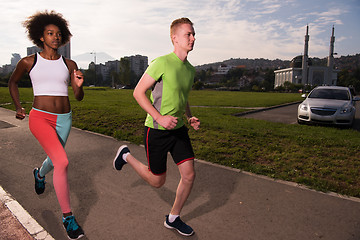 Image showing multiethnic group of people on the jogging