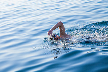 Image showing Man swimming in clear water