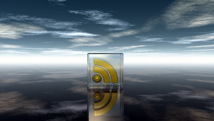 Image showing rss symbol in glass cube under cloudy blue sky - 3d illustration