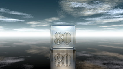 Image showing number eighty in glass cube under cloudy sky - 3d rendering