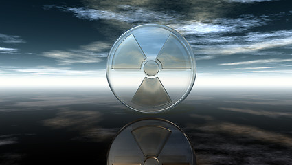 Image showing nuclear symbol under cloudy sky - 3d illustration