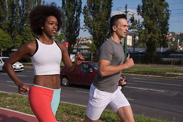 Image showing multiethnic group of people on the jogging