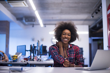 Image showing portrait of a young successful African-American woman in modern 