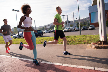 Image showing multiethnic group of people on the jogging