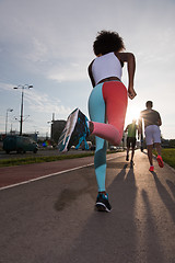 Image showing multiethnic group of people on the jogging