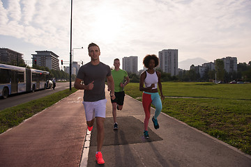 Image showing multiethnic group of people on the jogging