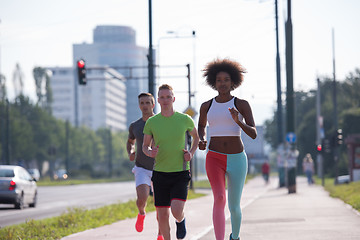 Image showing multiethnic group of people on the jogging