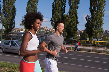 Image showing multiethnic group of people on the jogging