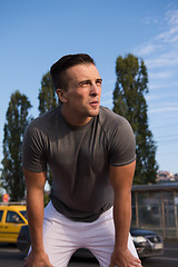 Image showing portrait of a young man on jogging