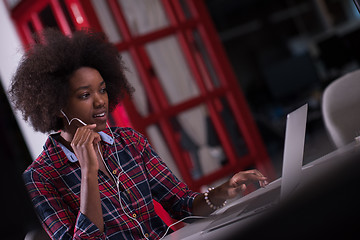 Image showing portrait of a young successful African-American woman in modern 