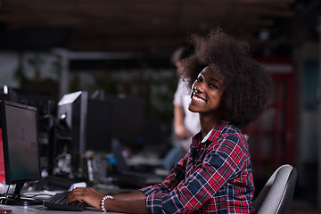 Image showing portrait of a young African American woman in modern office