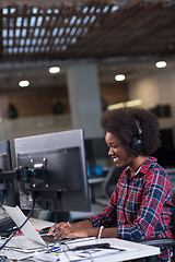 Image showing portrait of a young successful African-American woman in modern 