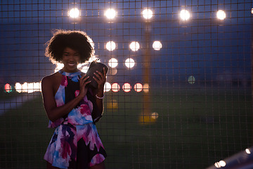 Image showing portrait of a young African-American woman in a summer dress