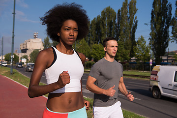 Image showing multiethnic group of people on the jogging