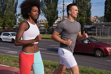 Image showing multiethnic group of people on the jogging