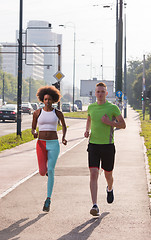 Image showing multiethnic group of people on the jogging