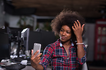 Image showing portrait of a young successful African-American woman in modern 