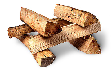 Image showing Pile of firewood stacked at each other