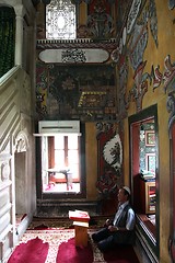 Image showing Muslim man reading the Koran in the Aladza painted mosque,Tetovo, Macedonia