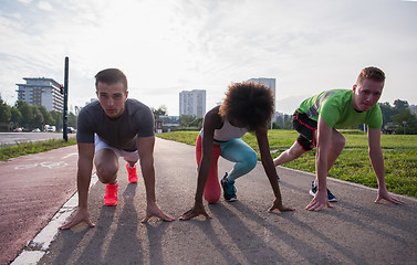 Image showing multiethnic group of people on the jogging