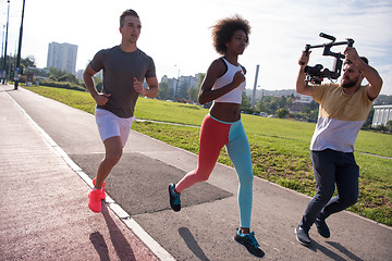 Image showing multiethnic group of people on the jogging